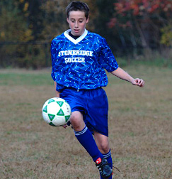 ms boy playing lacrosse